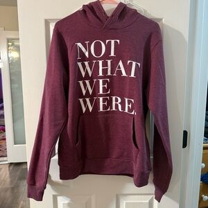 The Chosen Burgandy Graphic Hoodie – “Not What We Were” Quote Sweatshirt